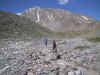 Torrey's peak in the background, Gray's is behind the gravel pile.  Some do both in one day!