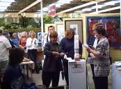 Judy presents maxine with her certificate.