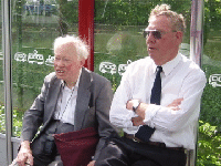 Bertil and Max sit waiting for the train