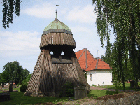 Church with bell tower in the garden