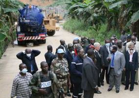 France has been providing technical assistance to the Ivorians in cleaning up the waste. Here, French minister Brigitte Girardin stands before a tanker truck seized as part of the investigation.