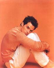 Antonio in orange shirt