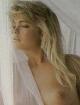 Erika Eleniak's naked rear