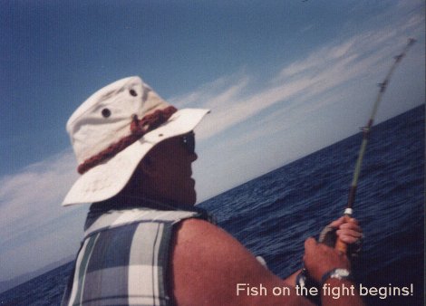 Larry was so exhausted and bent over from fighting the lousy star drag on his reel that I had to tilt the camera to get him in the picture!