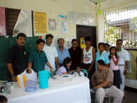 Dr. Ofiana and municipal officials on a MEDCAP mission in one depressed barangay...