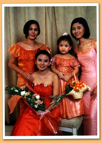 Carla with mom and sisters