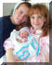 202_04_07DebDanKryHospitalBed.jpg (49623 bytes)