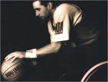 Black and white photograph of wheelchair Basketball Paralympist
