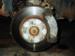 Just removed the caliper, it is just sitting on the axle shaft behind the wheel. At this point you can remove the brake pads. Notice how the pads and shims etc. are installed and remember to put them back on the same way later.