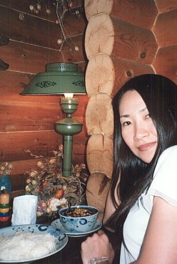 Kazumi in restaurant (26377 bytes)
