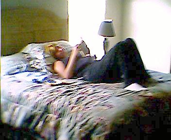 Chrissy Resting & Reading On Mom's Bed