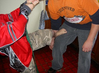 Thanksgiving at Bill Scott's house, 2005. Interrogating the prisoner.