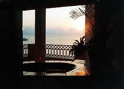 More sunset balcony, shot through the door to the unit.