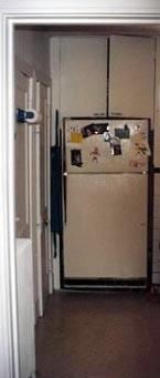 Old fridge, nestled in a bumpout. What a horrid idea.