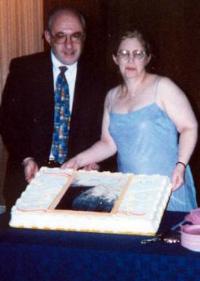 Our wedding cake, decorated with original artwork by Julie Hick.