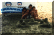 Christine, Jana and I with the sand castle we built