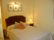 a bedroom of the apartment