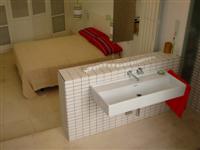 foto reforma cuarto de baño integrado en dormitorio