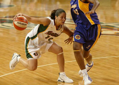 Sue Bird dribbles