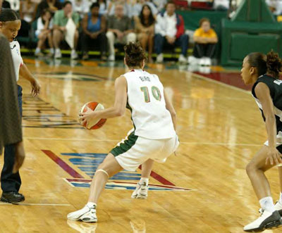 Sue Bird dribbles