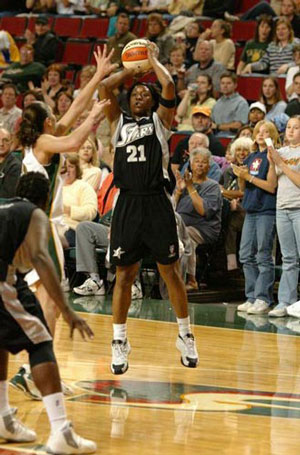 Sue Bird is on defense