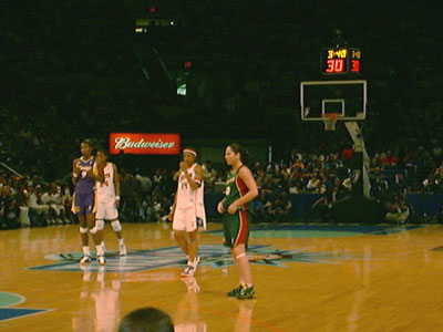 Sue and three other players looking on 