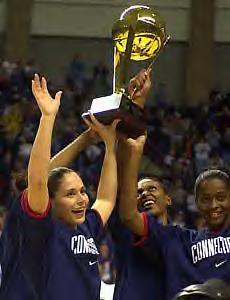 Sue Bird and teammates with trophy