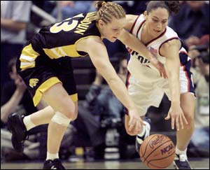 Sue Bird and April Calhoun Chasing Down the Ball