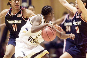 Sue Bird and Jessica Moore Block Yolanda Paige