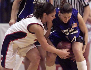 Sue Bird and Susan Murray Fight for Ball Possesion