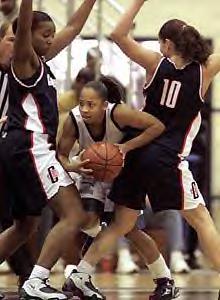 Sue Bird and Tamika Williams block Okiesha Howard