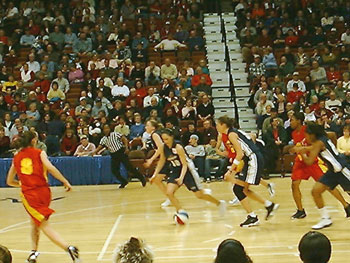 Sue dribbling the ball for a fast break