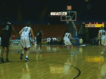 Sue taking it to the basket