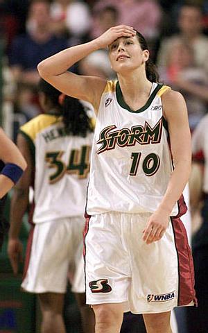 Sue Bird holding her forehead