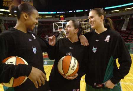 Sue Bird joking around with her former UConn Teammates