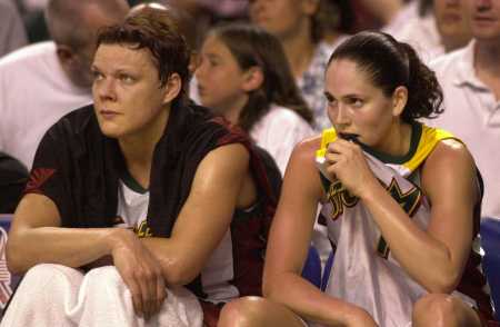 Sue Bird and Kamila Vodichkova on the bench