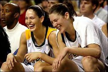 Sue Bird and Lauren Jackson on the bench