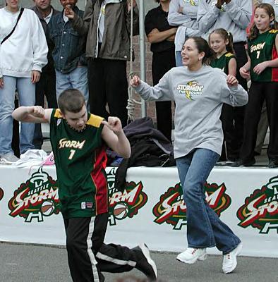 Sue Bird dancing at the Fan Fest