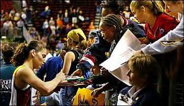 Sue Bird give autographs
