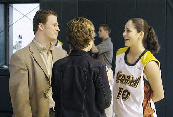 Sue Bird talks to media people