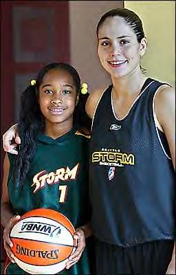 Sue Bird and a fan