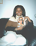 Taz with 2001 xmas present of her favorite artist.