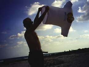 Flying a T-shirt 'kite' in Cozumel