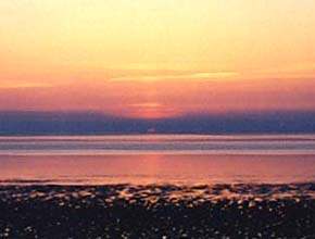 Sunset over a dike, Netherland