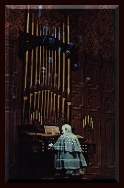 The master playing the organ