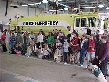 Puppy Raisers and pups at the PAPD presentation