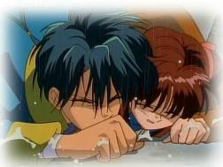 Tama pushes Miaka out of harms way and they land on the ground