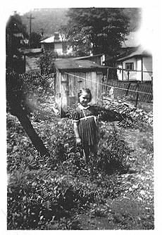 Cousin Elizabeth, Aunt Jenny's daughter; outhouse in far background