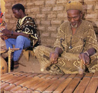 Souleymane Traore and his father in Nebadougou