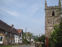 Street showing cottages and church